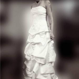 SIZE 12 David’s Bridal  White wedding gown .